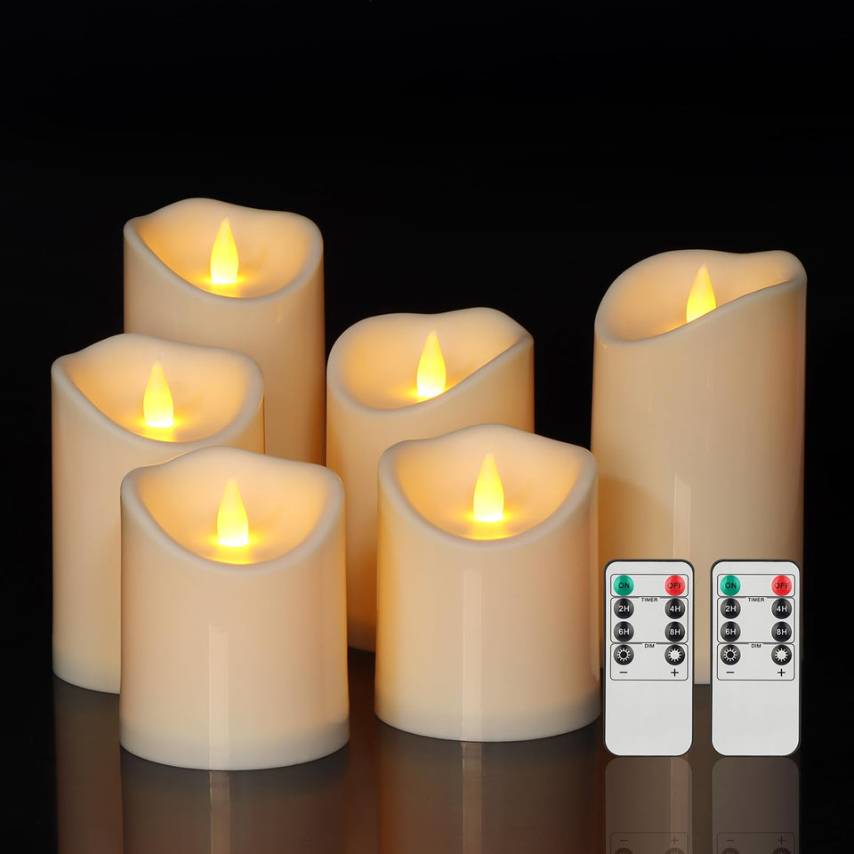 Haown dual-LED flameless candle pillars provide warm ivory glow for outdoor spaces.