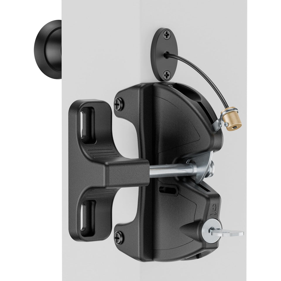 HAPPYGATE key lockable two-sided gate latch installed on wooden gate for secure outdoor access.