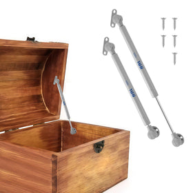HBL' soft-close toy box hinges in action with 150N gas strut for smooth closing.