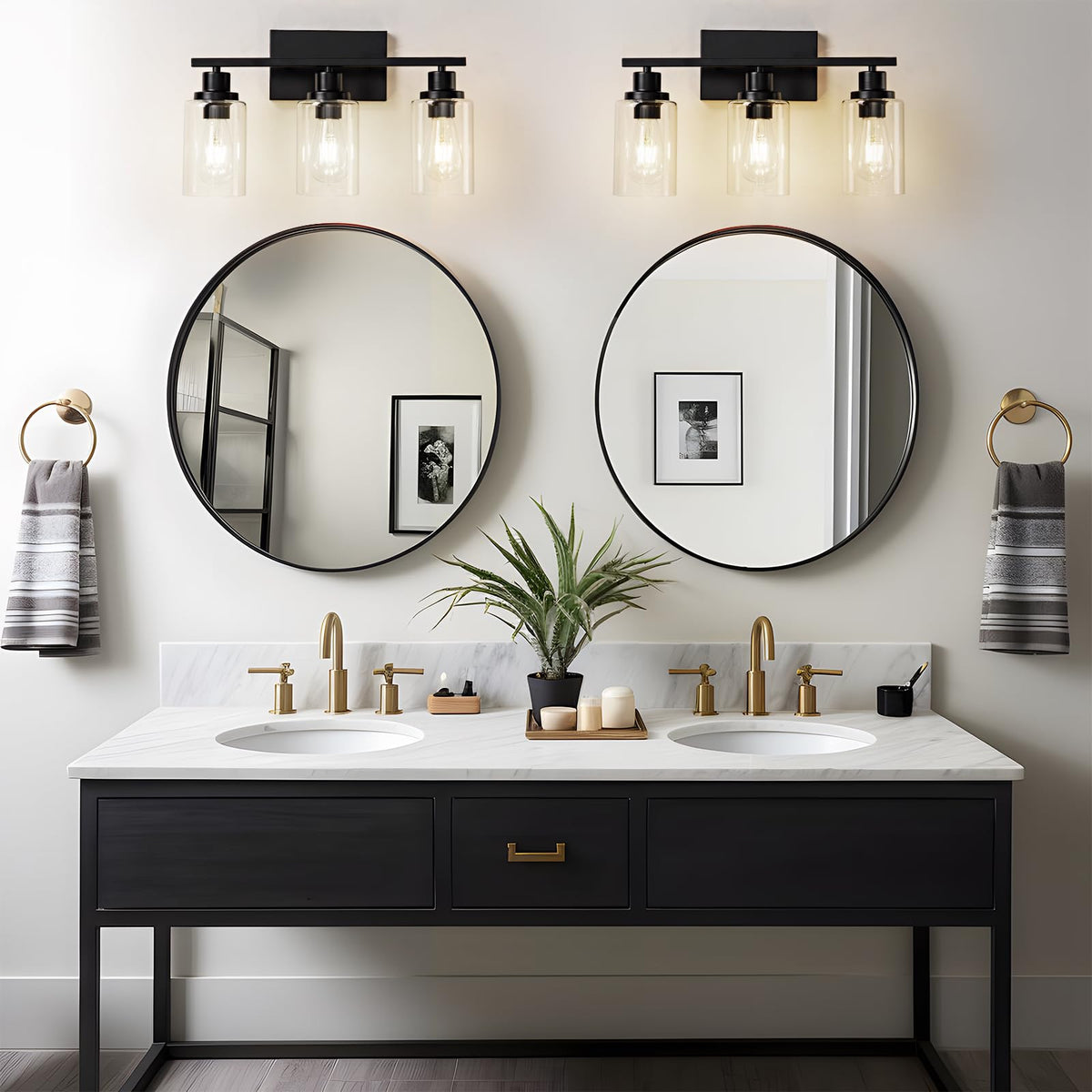HCCZ vanity light over mirror with clear glass shades enhances task lighting.