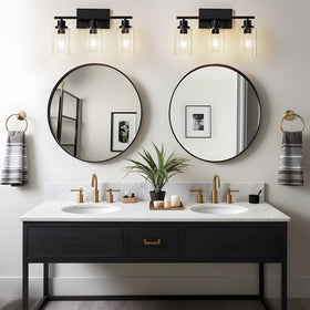 HCCZ vanity light over mirror with clear glass shades enhances task lighting.
