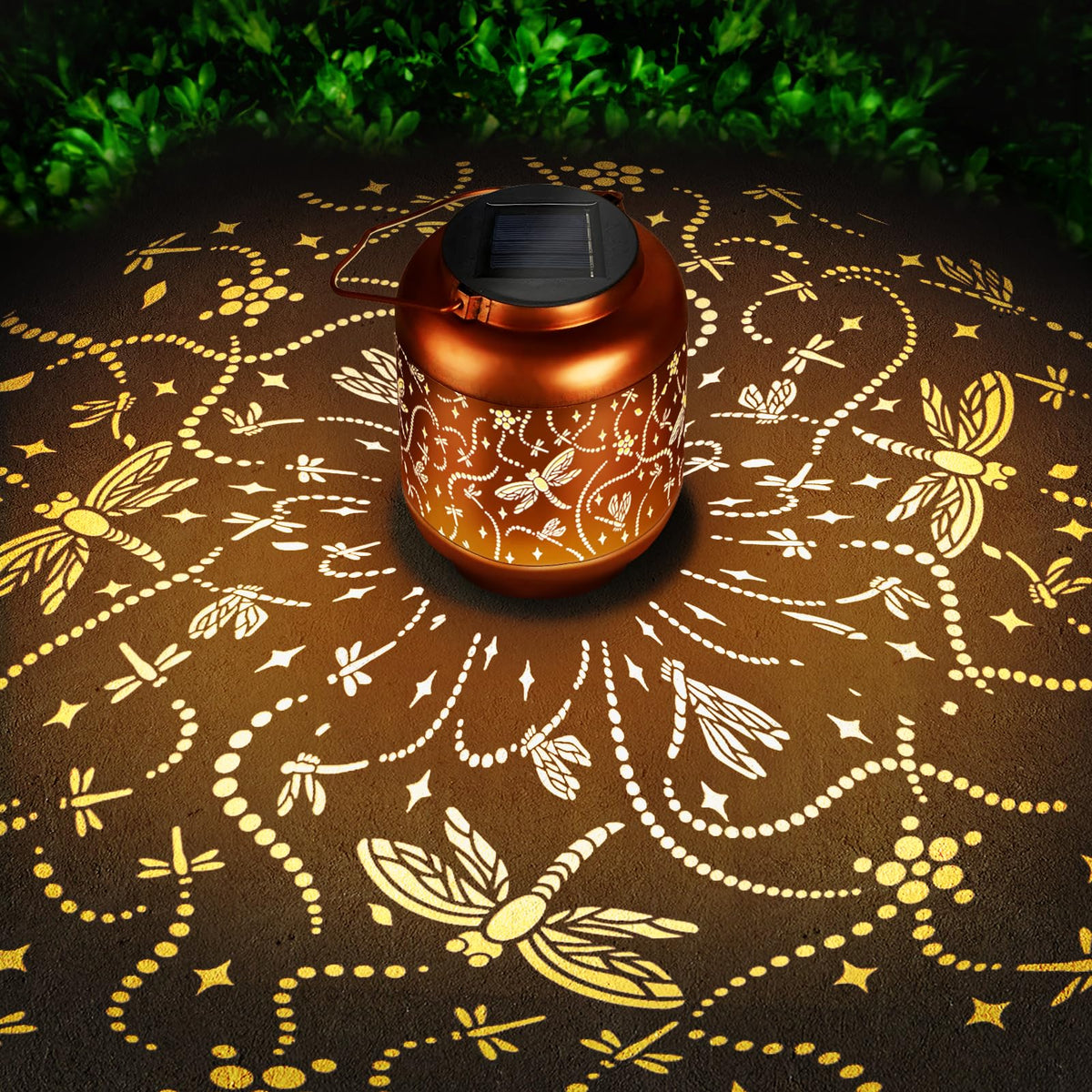 HEGUD dragonfly solar lantern glows warmly in the garden.