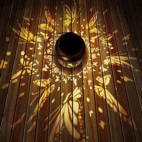 HEGUD gold copper butterfly lantern close-up shows intricate metalwork and glow