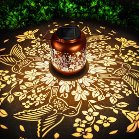 HEGUD hummingbird solar lantern with warm glow for welcoming outdoor evenings.