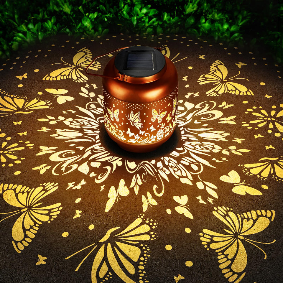 HEGUD Mothers Day butterfly solar lantern glowing softly in garden setting