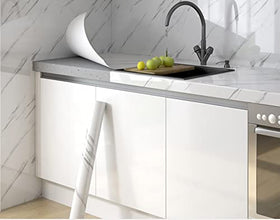 HELLKIT peel-and-stick marble wallpaper applied to shelves and bathroom surfaces for quick updates.