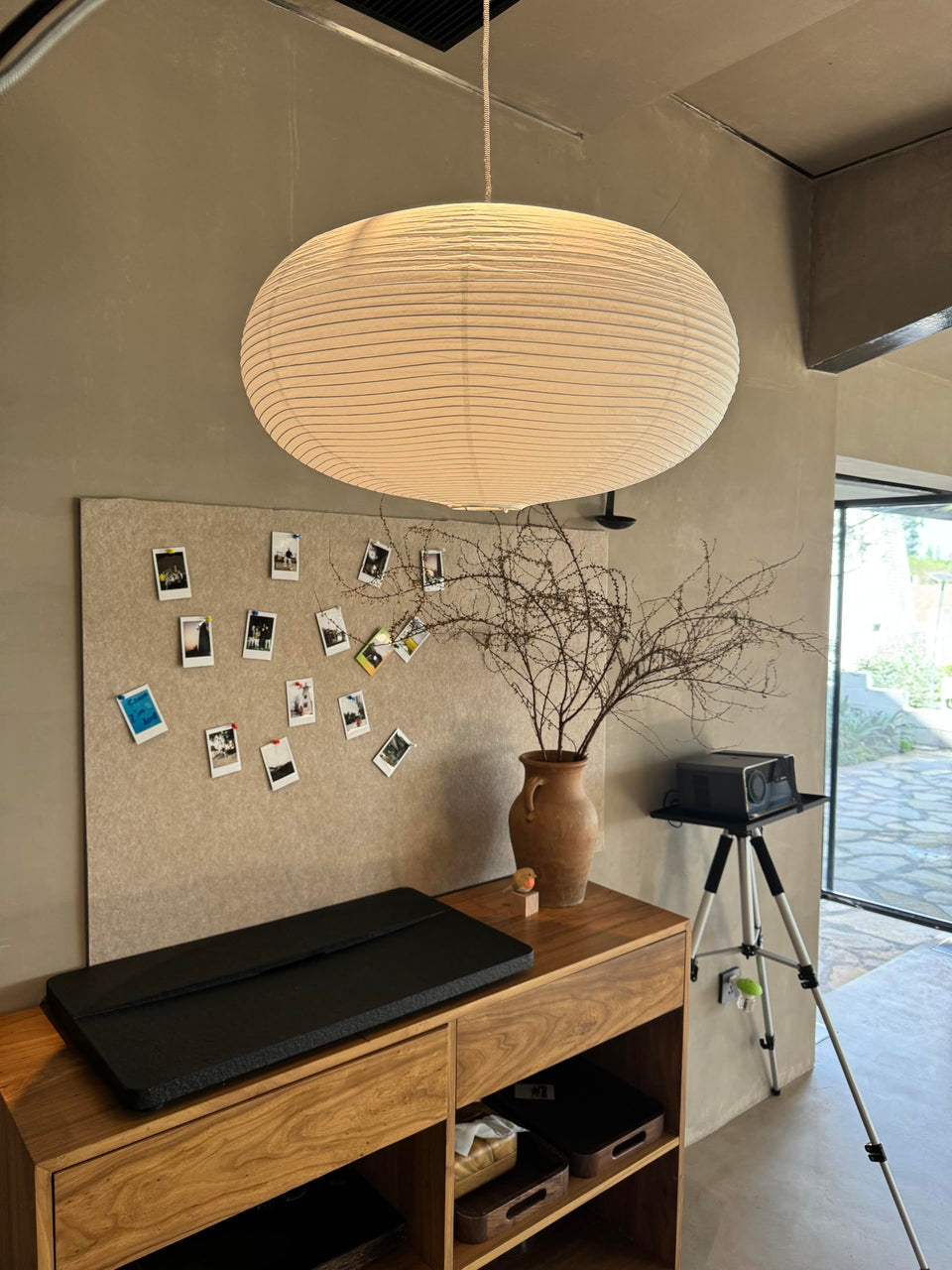 Henjjras large white oblate pendant shade front view, ideal for warm living room ambiance.