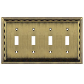 Henne Bery Sunken Pearls quad-toggle wall plate in antique brass adds durable decorative hardware.