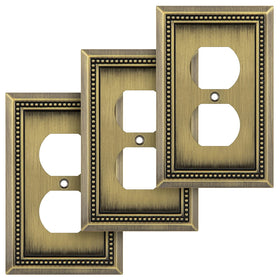 Henne Bery Sunken Pearls wall plate in antique brass for single duplex switches