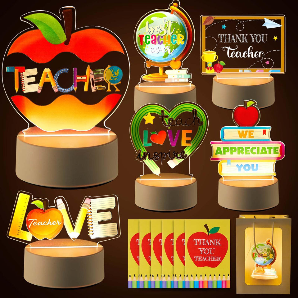 Henoyso engraved night light Apple design provides a warm desk glow for teachers.