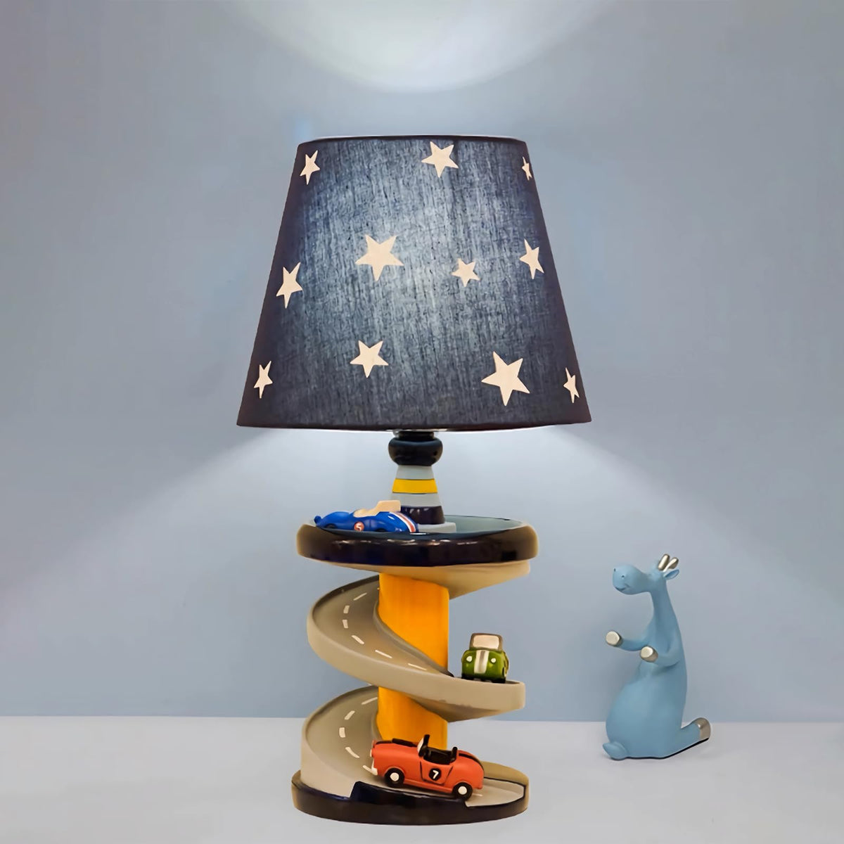 HERBESTBAY table lamp racing car side view adds playful lighting to a child's room.