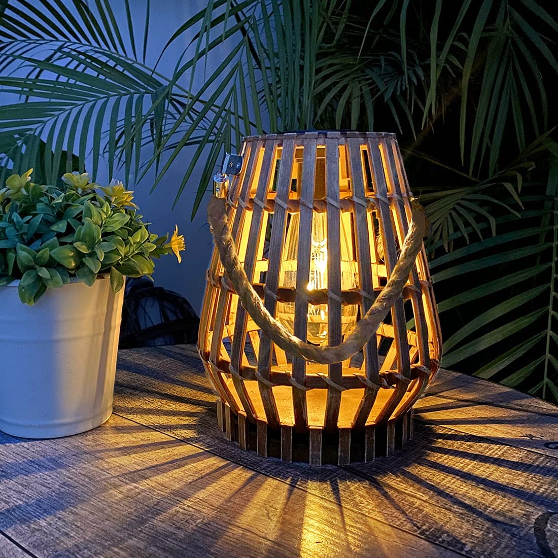HERJIATK solar hanging lantern with bamboo pattern offers warm outdoor ambience.