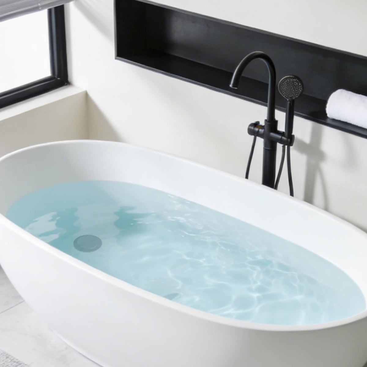 Hibbent matte black finish enhances modern bathrooms