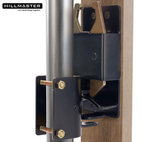 Hillmaster latch on farm fence aids livestock security and access.