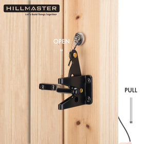 Hillmaster heavy-duty gate latch in a black finish securing a wooden gate.