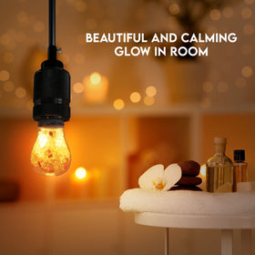 Himalayan Glow 60W equivalent bulb delivers brightness with a soft pink hue.