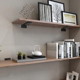 Hitomen matte black industrial brackets with hidden countersunk design for a clean look.