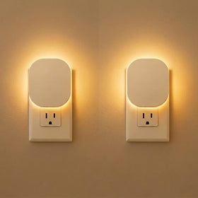 Hiwrolat plug-in night light with motion sensor providing hands-free hallway lighting