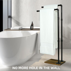 Hjarta black towel rack rails add industrial charm while keeping towels accessible.