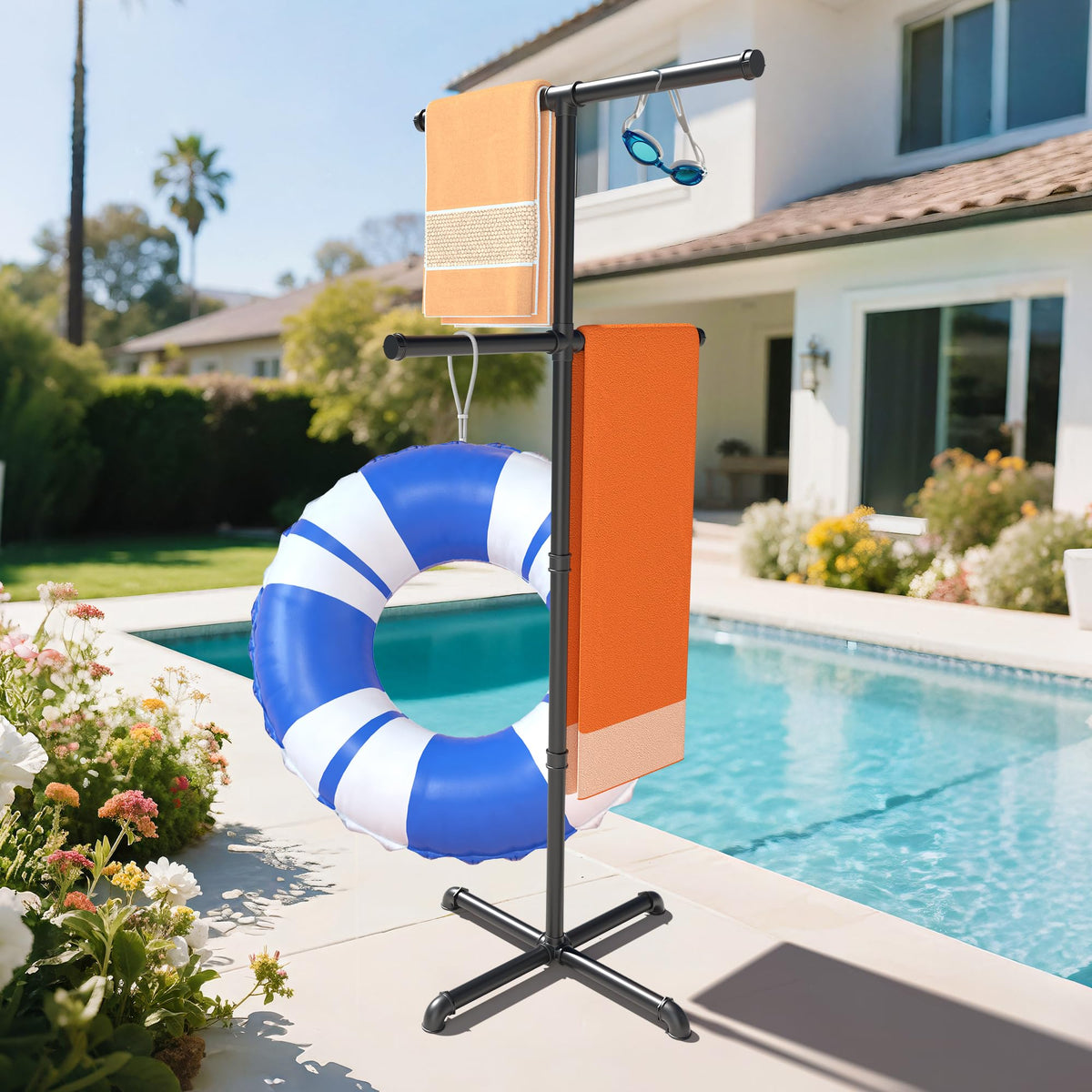 Hjarta outdoor towel rack beside pool with four bars for towels and gear.
