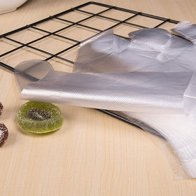 HLIN easy-on, easy-off gloves shown during quick kitchen tasks.