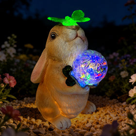 Hogni solar bunny garden statue glows softly at night for cozy outdoor charm