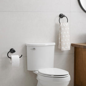 Hoimpro oil rubbed bronze toilet paper holder keeps essentials close.