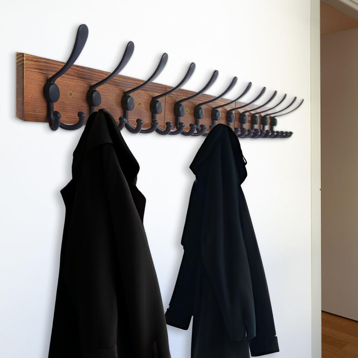 Installed rack in a bathroom, holding towels