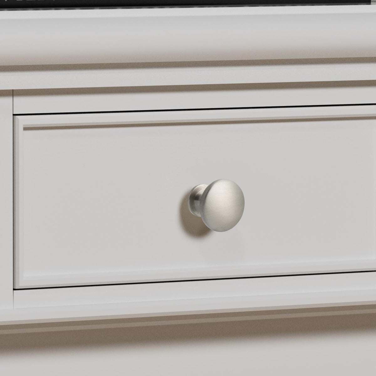 Homdiy round knobs brushed nickel installed on a kitchen cabinet
