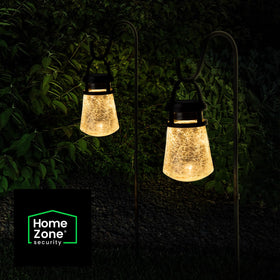 Home Zone Security auto-on sensor lantern conserves energy after dusk.