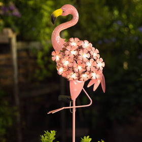 Homeimpro Flamingo solar light for outdoor decor glowing at dusk for ambiance