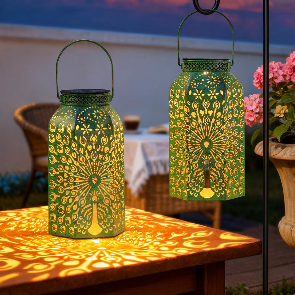 HOMEIMPRO Peacock lanterns in antique green add timeless outdoor charm.