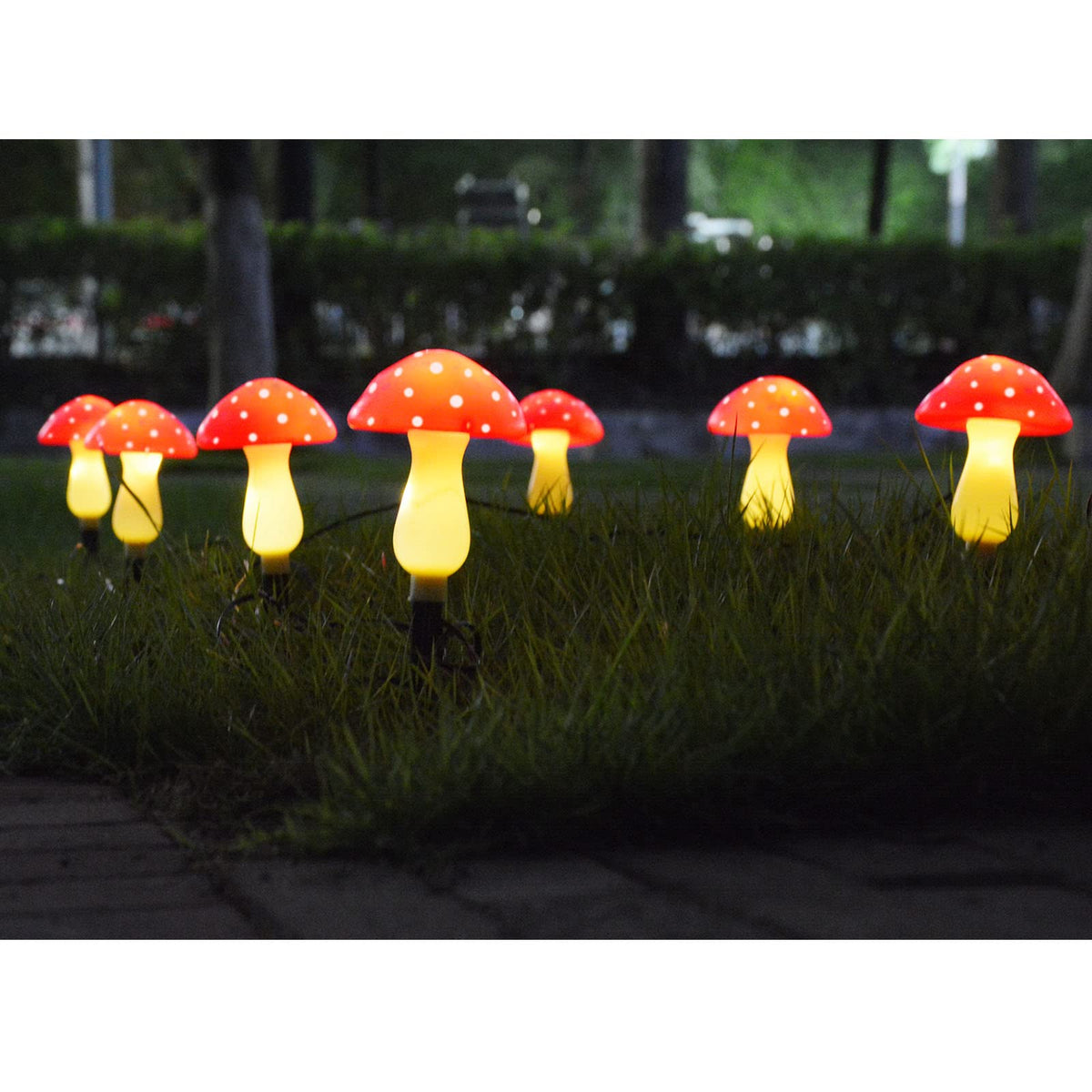 Homeleo red mushroom solar light standing up to weather with IP65 rating.