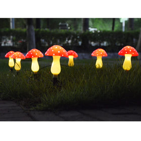 Homeleo red mushroom solar light standing up to weather with IP65 rating.