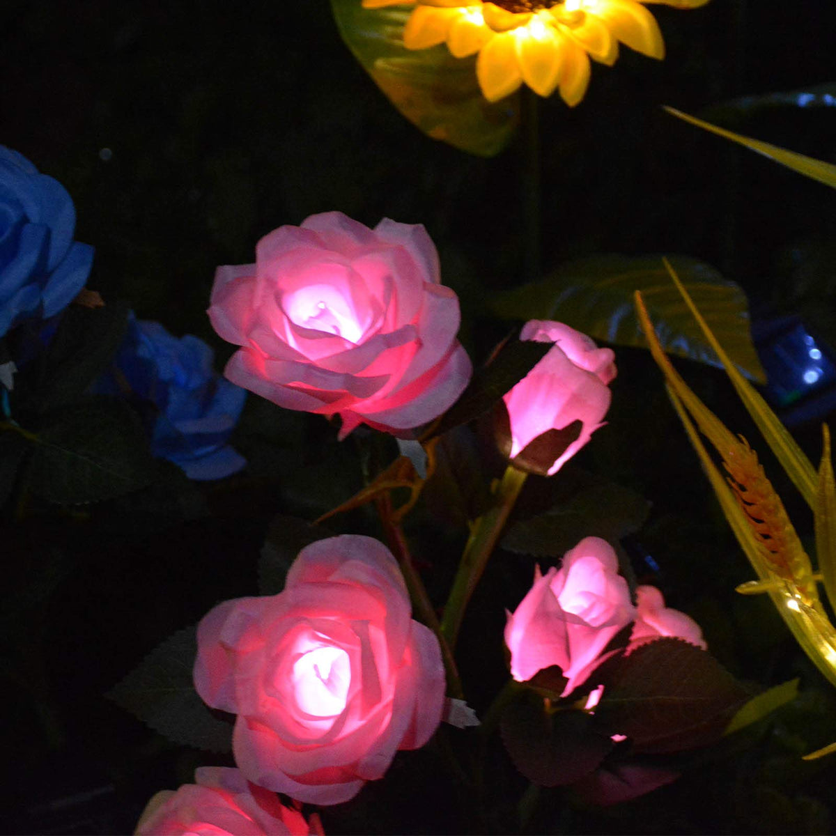 Homeleo 6-flowers stake lights night view with warm garden glow.