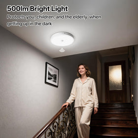 Homelist remote-controlled ceiling light being adjusted from across a room