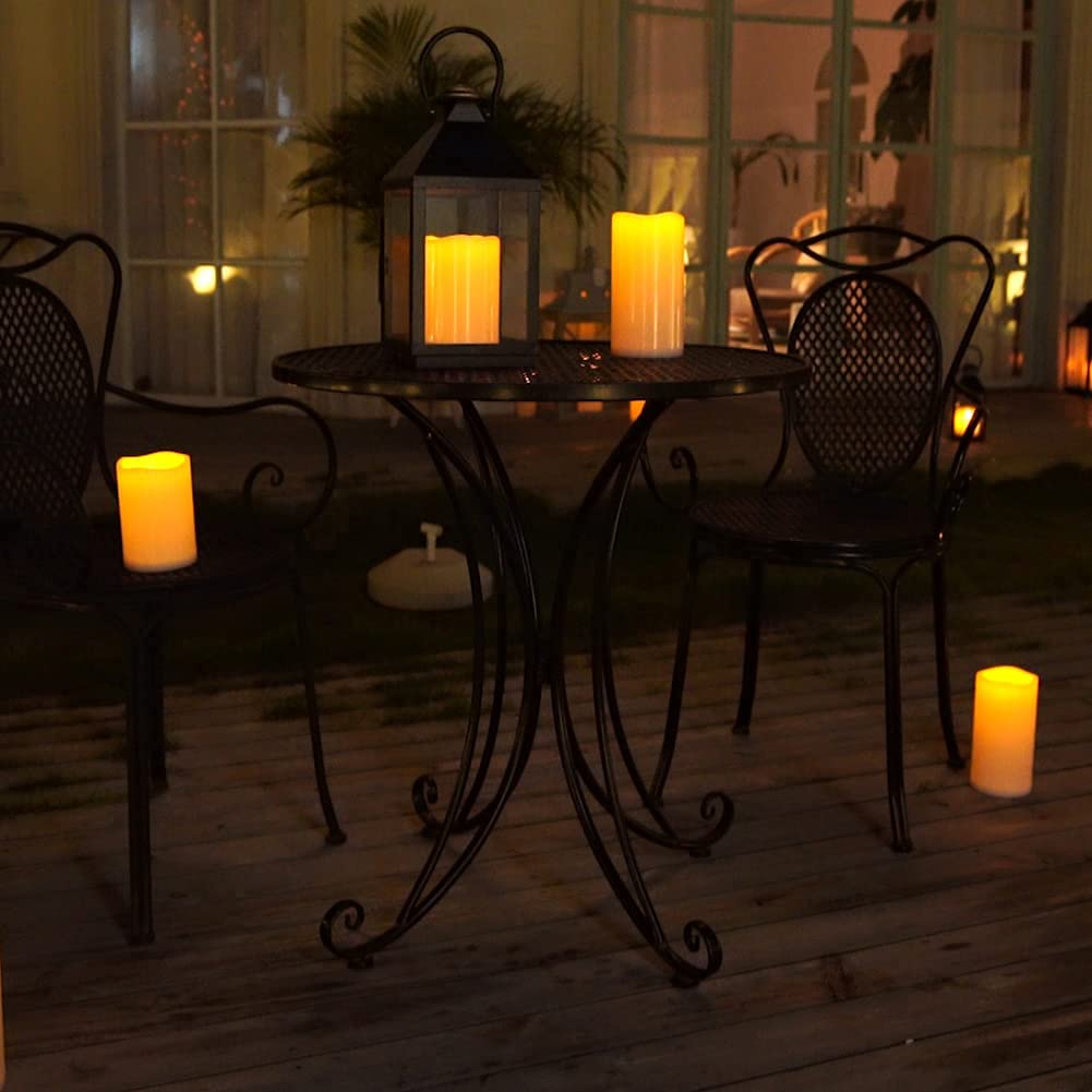 Homemory 10-inch outdoor flameless candle creates warm, dramatic lantern lighting outdoors.
