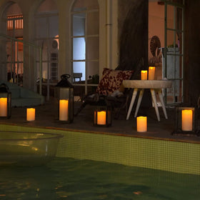 Homemory 8-inch outdoor flameless candle lights gardens with long-lasting glow.