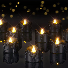 Homemory black dripping tea light for pumpkin decoration with safe flameless glow.