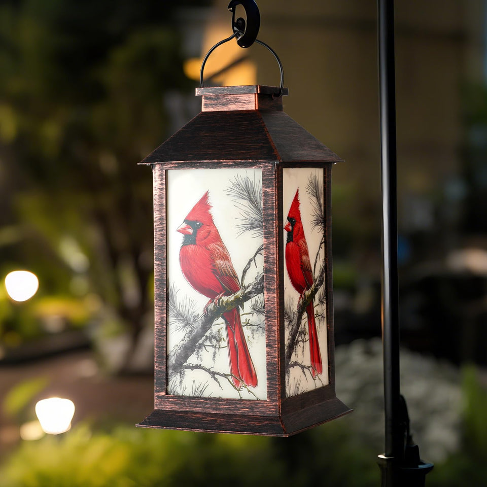 Homemory hanging solar lantern with bird motif for tranquil garden lighting.