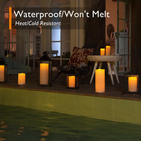 Homemory large LED pillar candles create wedding garden glow.