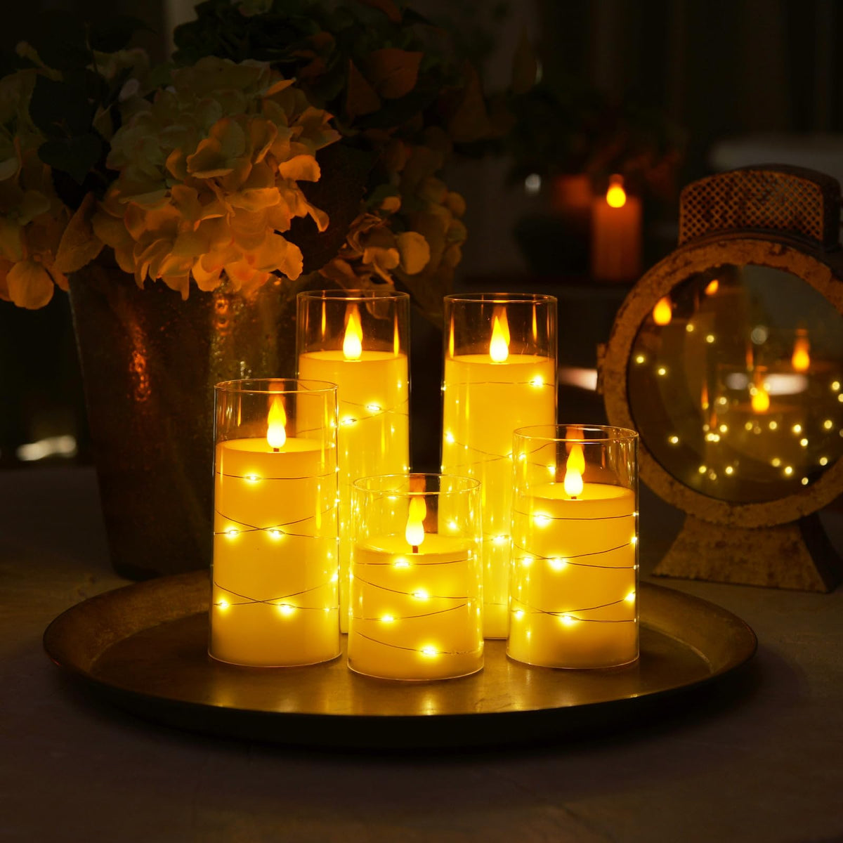 Homemory Pure White flameless candle with star string lights in a living room setup