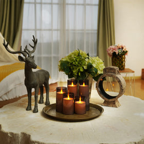 Remote control and timer let you adjust modes without reaching the candles.