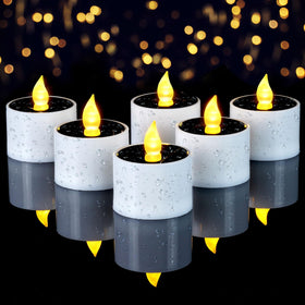 Homemory solar tea candle on outdoor lantern glows softly for ambient evenings.