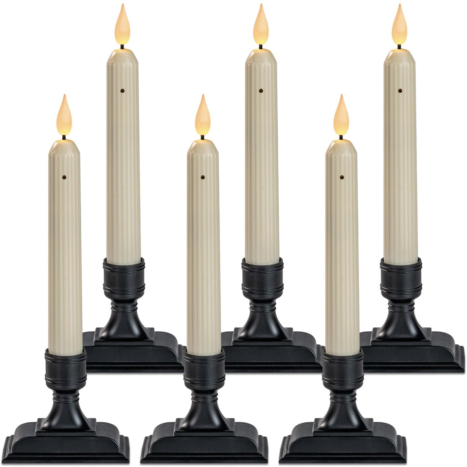 Homemory window candles with dusk-to-dawn sensor glow on a lit window