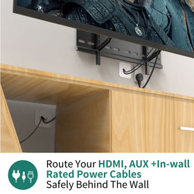 HomeMount two cable manager brackets organize multiple HDMI and power cords neatly