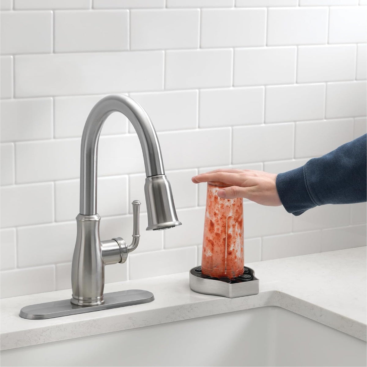 Homewerks Glass Rinser's matte black finish complements modern kitchen fixtures.