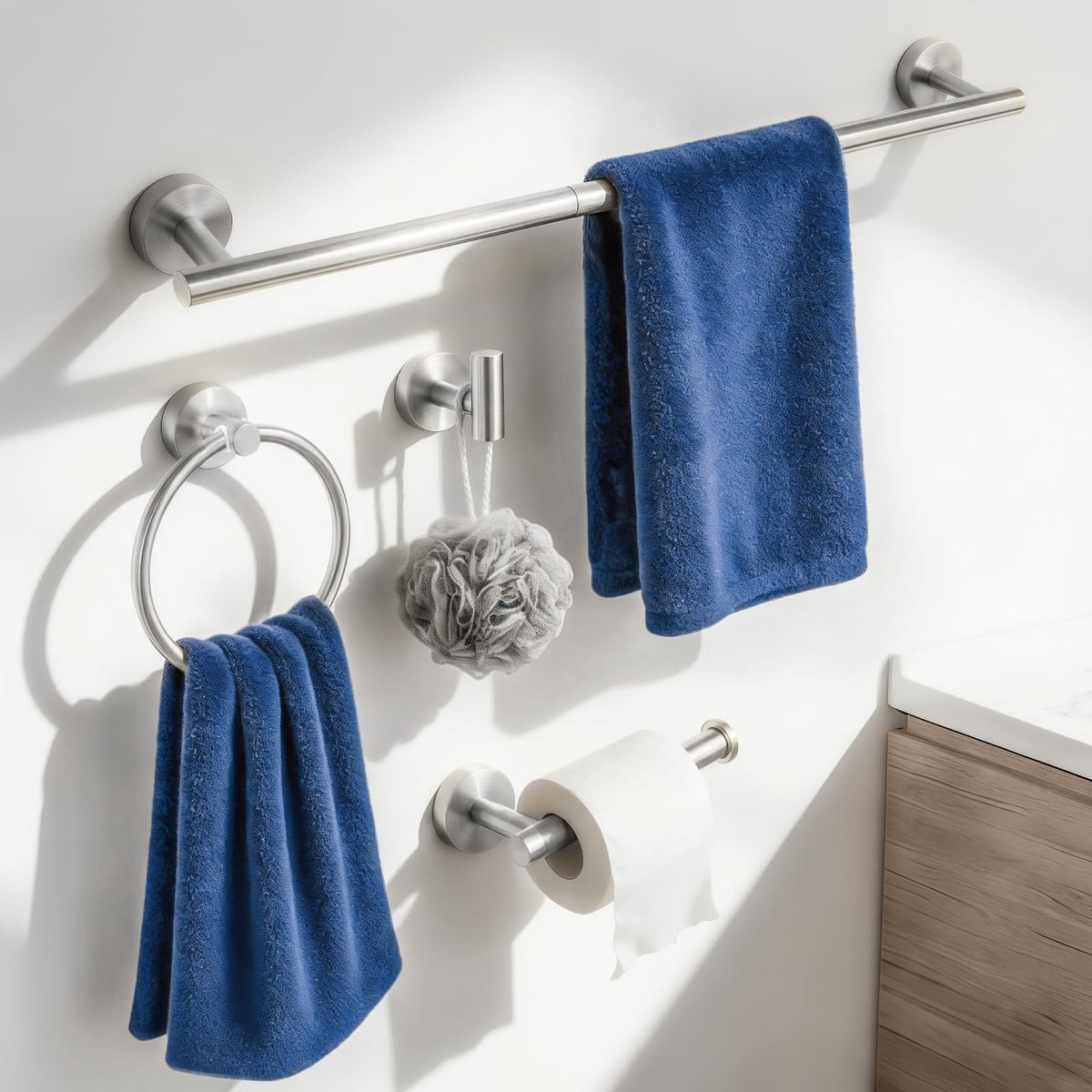 Homotek brushed stainless details enhance durability and style in bathrooms.