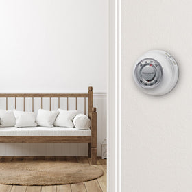 Honeywell Home CT87N1001 wall-mount installation view for simple setup.