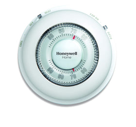 Honeywell Home round thermostat dial closeup for easy temperature control.